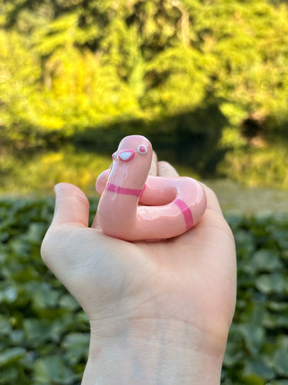 WORM THATS BEEN PECKED BY A BIRD